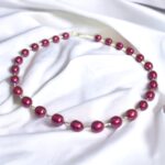 Handmade and one of a kind with vintage deadstock cranberry pearls.